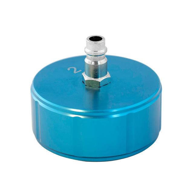 A blue metal cooling system cap with a internal diameter of 60mm, marked no 2
