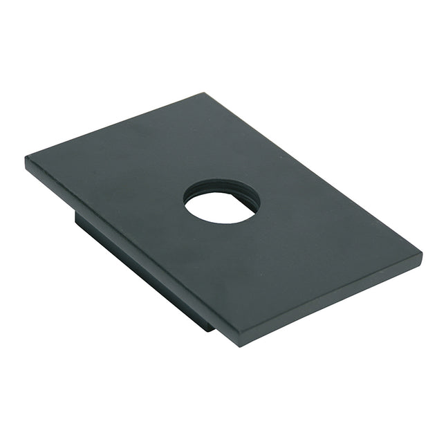 A  metal press plate with a hole in the center, designed for use with a hydraulic workshop press.